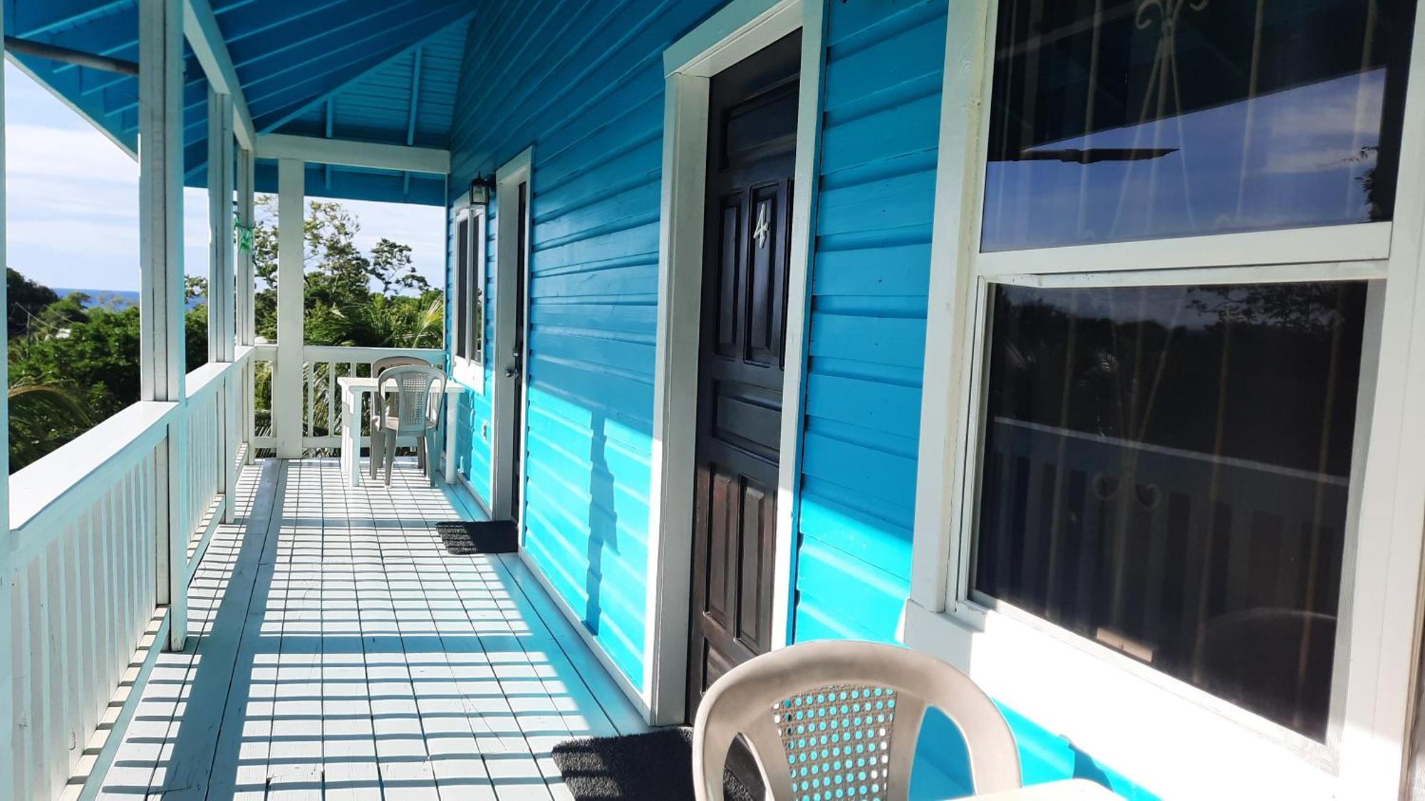Guava Grove Resort & Villas Sandy Bay Номер фото